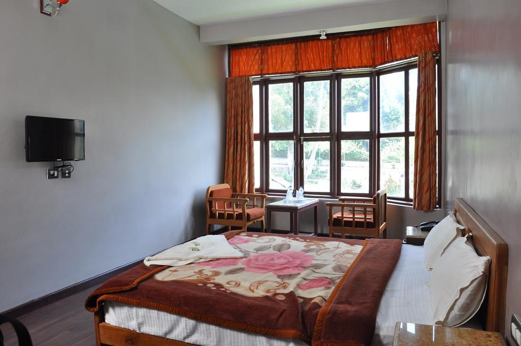 Grand Paradise Inn Kodaikanal Pokoj fotografie