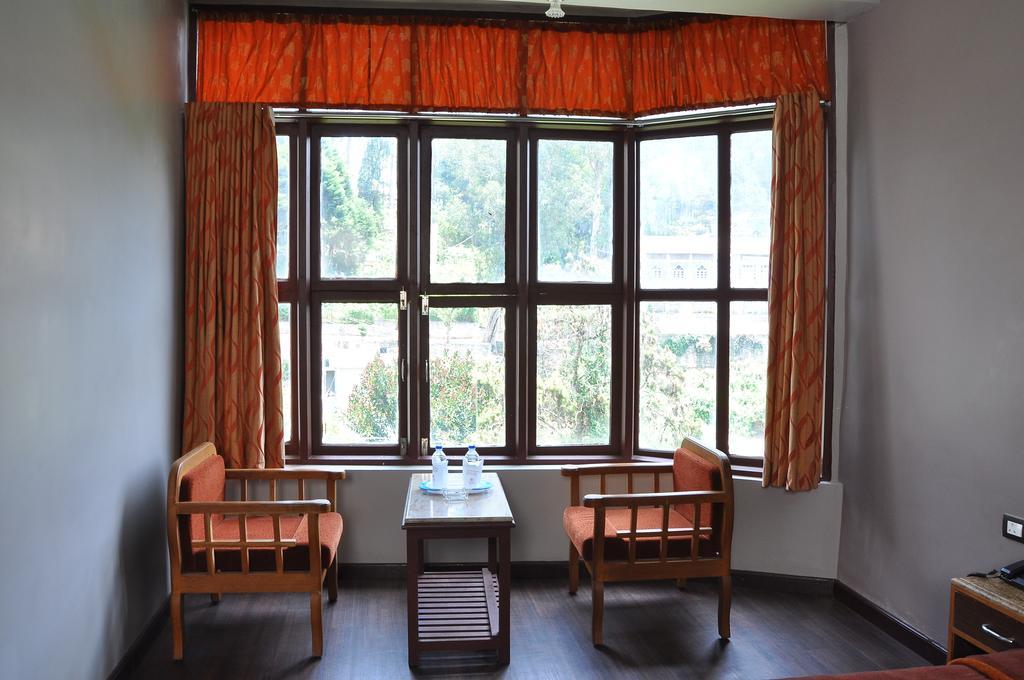 Grand Paradise Inn Kodaikanal Pokoj fotografie